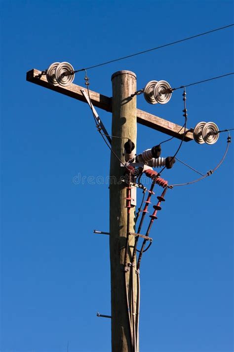 Timber Power Pole And Power Lines Stock Photo - Image: 15942000