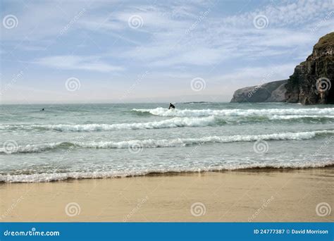 Surfer Surfing Near Ballybunion Cliffs Stock Image - Image of action ...