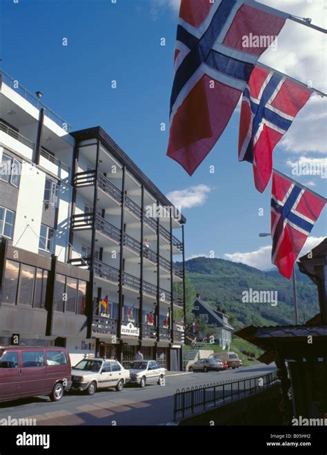 Ulvik Hotel and Norwegian flags, Ulvik, Hordaland, Norway Stock Photo ...