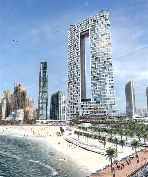 killa design tops 'address' beach resort towers with bridging infinity pool