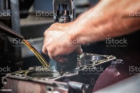 Repairing Engine In Auto Repair Shop Engine Head Stock Photo - Download ...