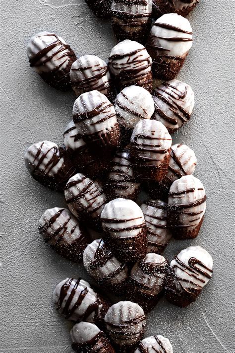 Hot Chocolate Madeleine Cookies with Marshmallow Frosting • A Simple Pantry