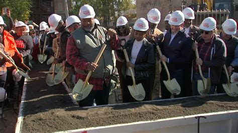 Project HOOD's Corey Brooks, pastor of South Side Chicago Church, lays ...