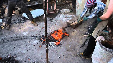 Making bloomery iron at Bushfire Forge, July 2013 - YouTube