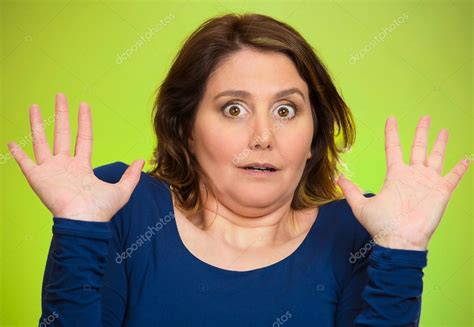 Shocked scared middle aged woman Stock Photo by ©SIphotography 51700495