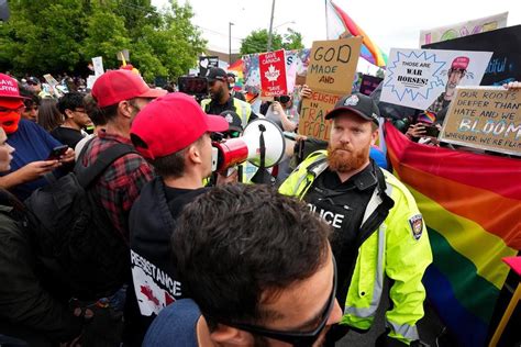 Duelling protests over LGBTQ rights outside Ottawa schools draw hundreds