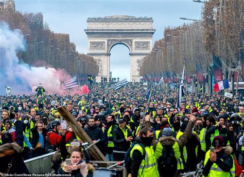 Paris Riot Police Clash With Protesters Demonstrating Over Fuel Tax ...