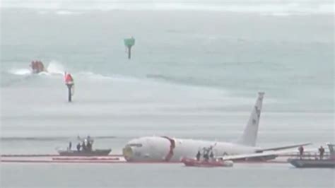 WATCH: US Navy plane with nine onboard overshoots runway, lands in ocean – Firstpost