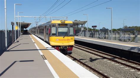 QR electric suburban train number 62 departing from Kallangur Station bound for Kippa Ring ...