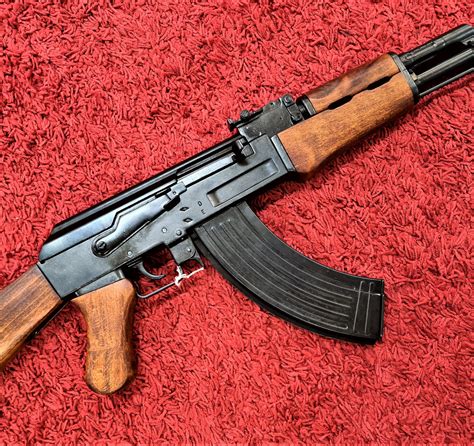 Spule Überfall Einschreiben ak 47 assault rifle with wood stock denix ak 47 Turnier Europa Chip