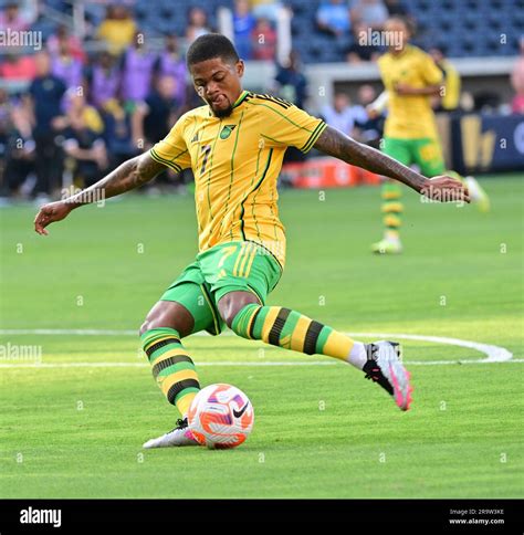 St. Louis, USA. 28th June, 2023. Jamaica forward Leon Bailey (7) winds ...