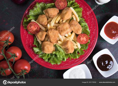 Deep fried chicken nuggets Stock Photo by ©igordutina 291172032