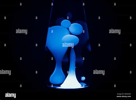Blue lava lamp, black background, horizontal format with copy space Stock Photo - Alamy