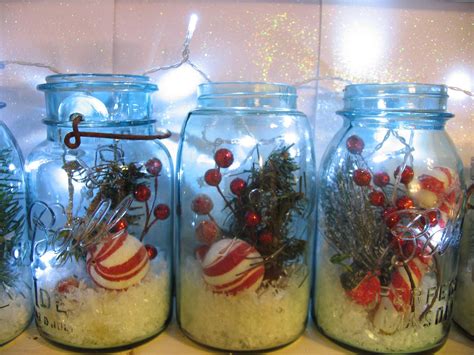 Mason jars filled with Christmas picks,snow, and lights for holiday cheer!