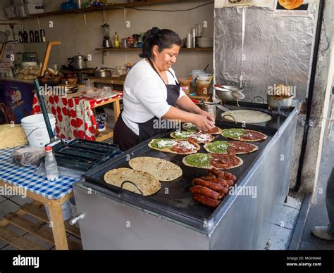 Puebla, Mexico, South America: [Woman cooking memelas, tacos ...