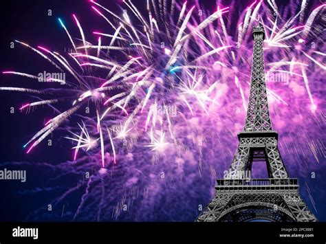 Celebratory colorful fireworks over the Eiffel Tower in Paris, France ...