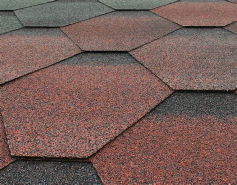 Premium Photo | Photo of a fragment of bitumen roofing shingles of different colors fragment of ...