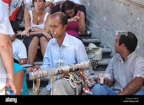 Street jewellery vendor spotted on crowded Piazza di Spagna stairs in ...