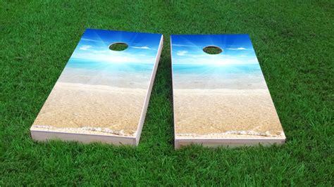 Beachs, Pirates, Sunsets and Tropical Paradise themed cornhole game sets.