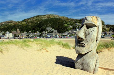 Gray Wooden Moai Statue on Sand · Free Stock Photo