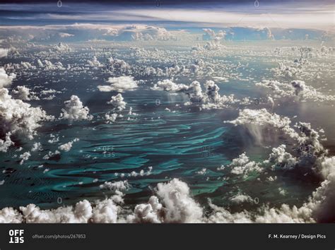 Cumulus clouds over the Caribbean stock photo - OFFSET