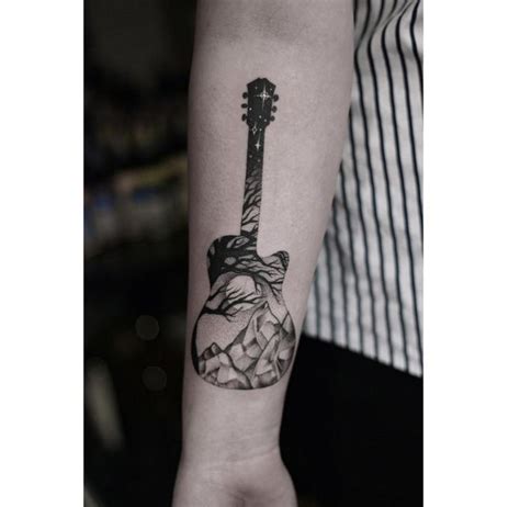 10 Guitar Tattoos That Rock | Music tattoo designs, Tattoos for guys, Guitar tattoo design