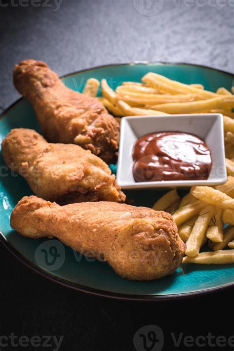 Fried chicken with french fries 23193303 Stock Photo at Vecteezy