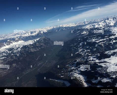 Snow covered mountains of Switzerland Stock Photo - Alamy