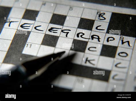 The Daily Telegraph Newspaper crossword puzzle Stock Photo - Alamy