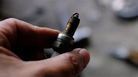 Carbon Fouled Spark Plug one Cylinder: Causes, Symptoms & Fixes ...