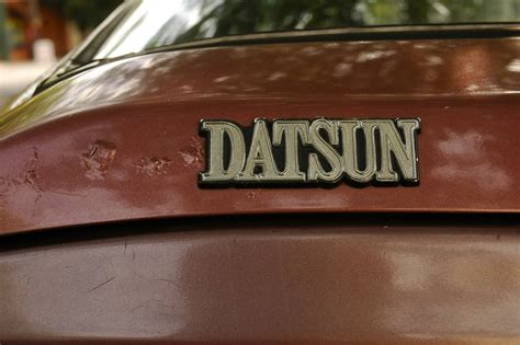 OLD PARKED CARS.: 1976 Datsun F10 Hatchback.