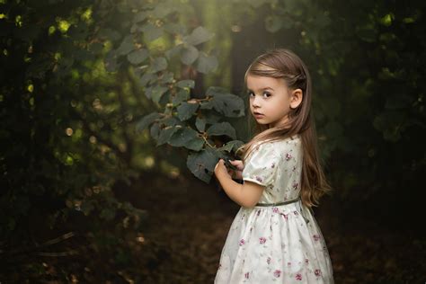 Little Girl Walking In The Woods