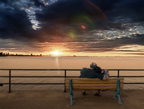 Older Couple on Bench Enjoying Sunset Stock Photo - Image of relax, married: 28084504