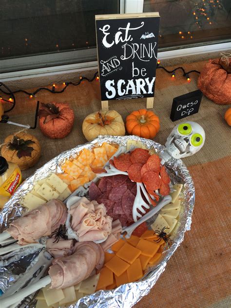 Dead meat. Halloween deli meat and cheese platter. Skeleton purchased from the party store ...