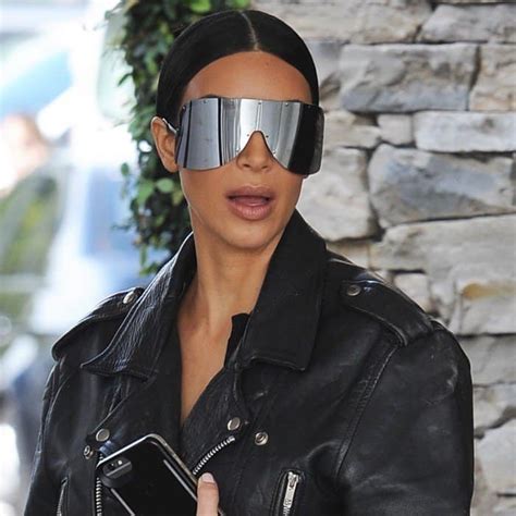 Kim Kardashian Wears Black Rick Owens Plastic Shield Sunglasses