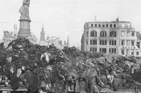 A pile of bodies awaits cremation after the bombing of Dresden, 1945 ...