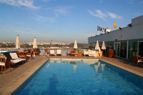 vue depuis la piscine - Picture of Golden Tulip Farah Rabat, Rabat - TripAdvisor