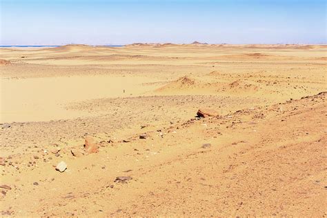 Sahara desert landscape in the south of Egypt. Photograph by Marek Poplawski - Fine Art America