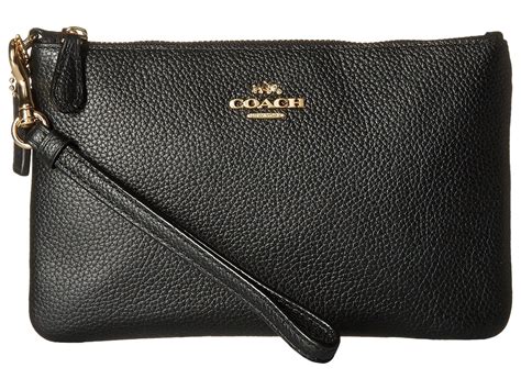 COACH Small Leather Wristlet in Black | Lyst