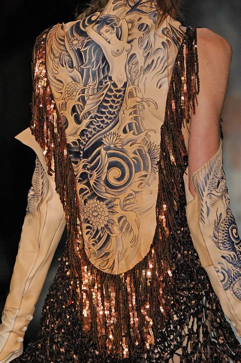 A Brief History of Tattoo-Inspired Fashion | Vogue