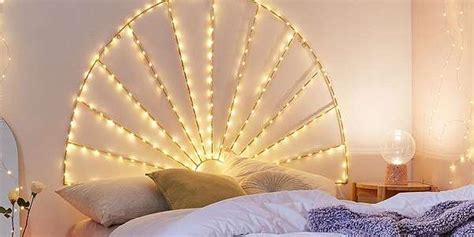 We NEED this twinkling fairy lights headboard from Urban Outfitters home