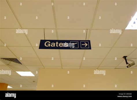 Airport gate sign Stock Photo - Alamy