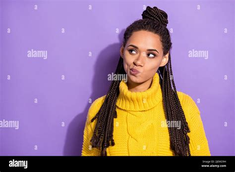 Photo of young attractive african woman serious look empty space think minded isolated over ...