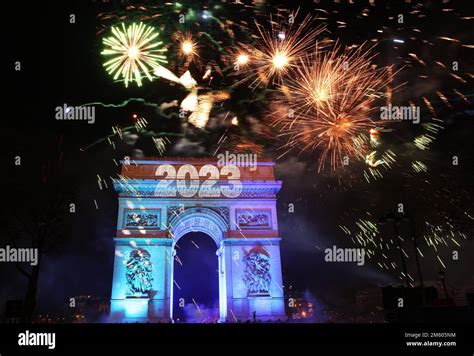 Paris, France. 1st Jan, 2023. Fireworks illuminate the sky over the Arc ...