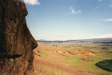 Statue looking out over the landscape of Easter Island | Easter Island | Travel Story and ...