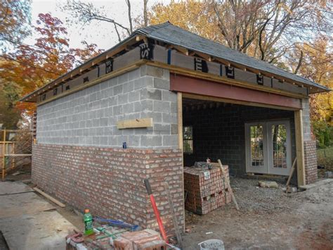 Brick veneer being installed at new 24′ x 26′ garage in City of Richmond – RBM Remodeling ...