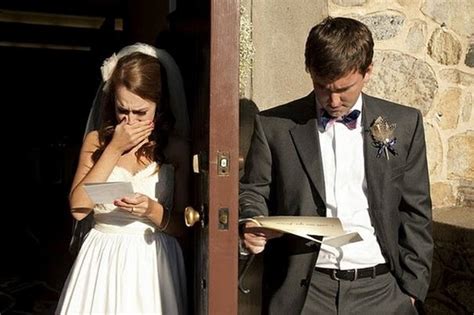 Minutes before the ceremony, a bride and groom swap notes and read them on either side of their ...