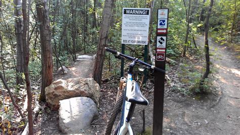 Mountain biking at Theodore Wirth Park: a fun and very tricky skinny gets my attention ...