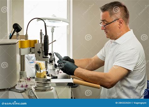 Dental Technician Working with Tooth Denture Stock Photo - Image of prosthetic, machine: 284322634