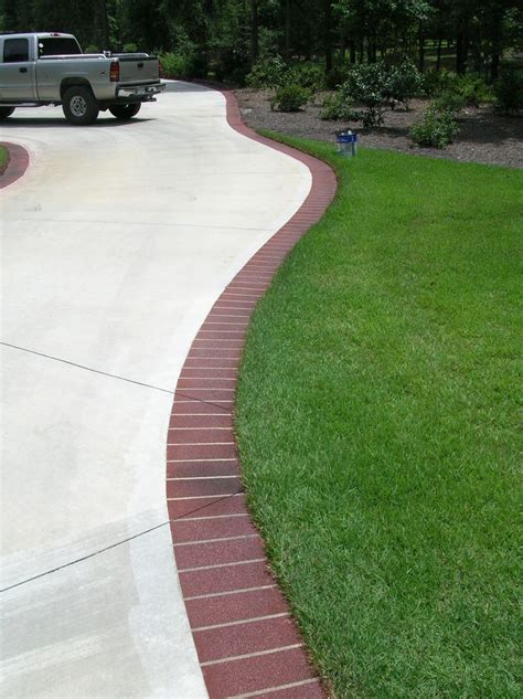 concrete driveway lined with bricks - Google Search | Brick edging, Driveway design, Patio edging